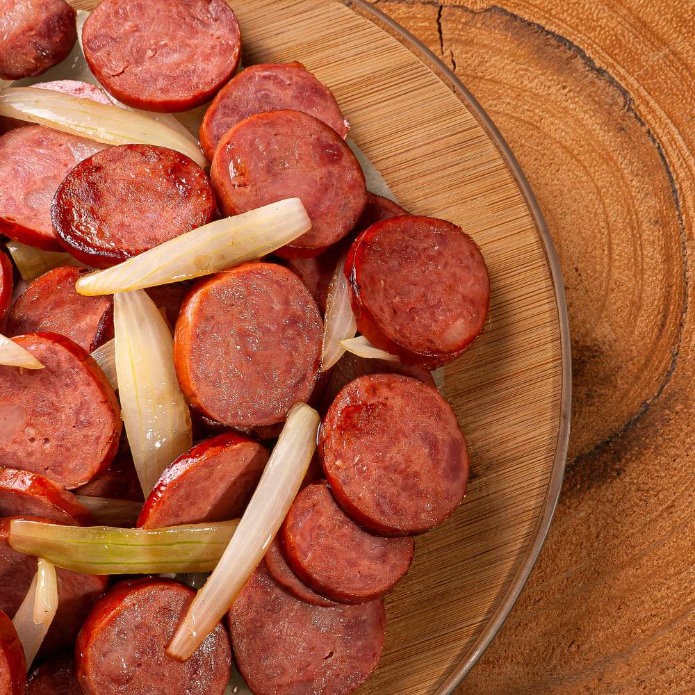 Chorizos mixto, especial y español de Colombo Alemana presentados con ingredientes frescos