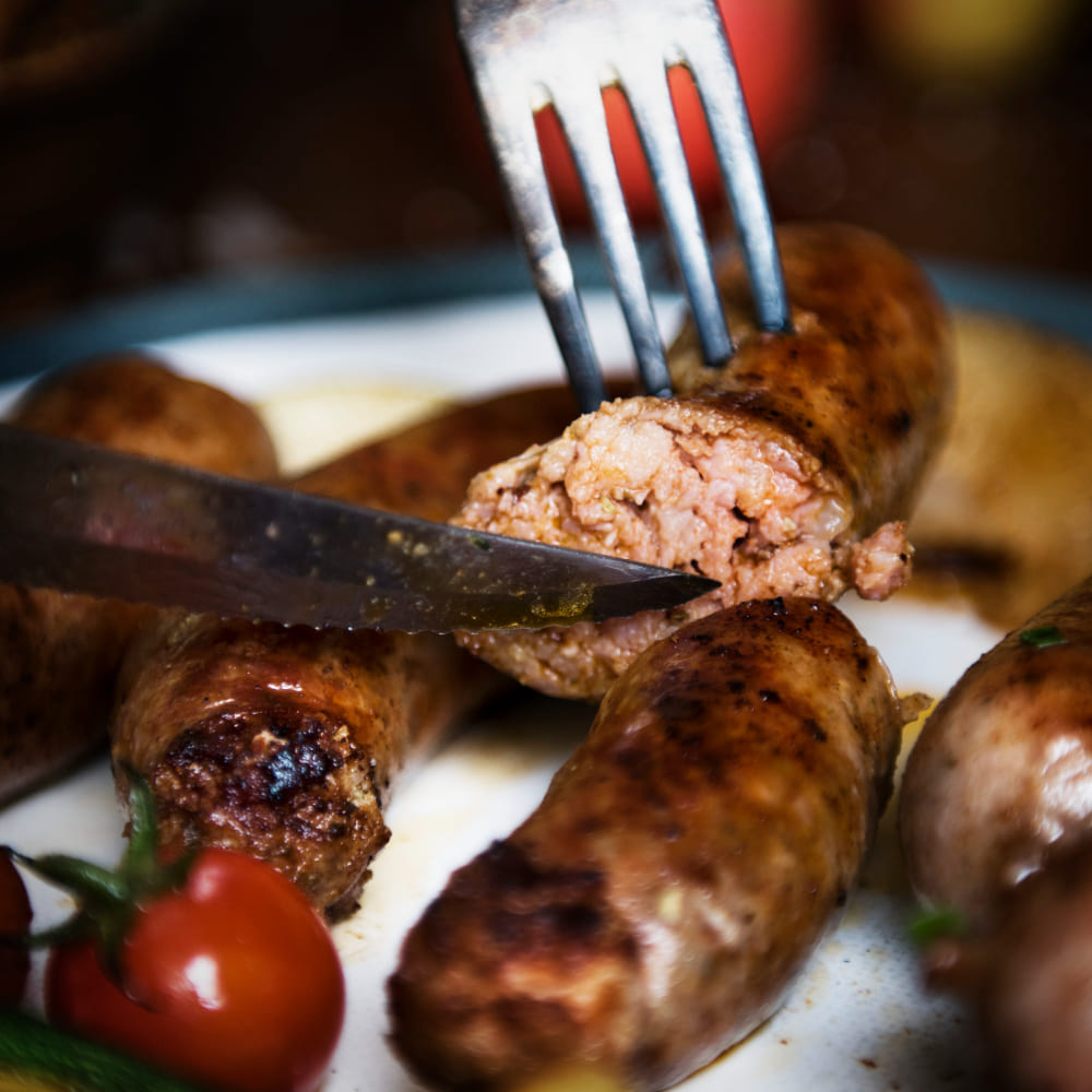 Chorizos mixto, especial y español de Colombo Alemana presentados con ingredientes frescos